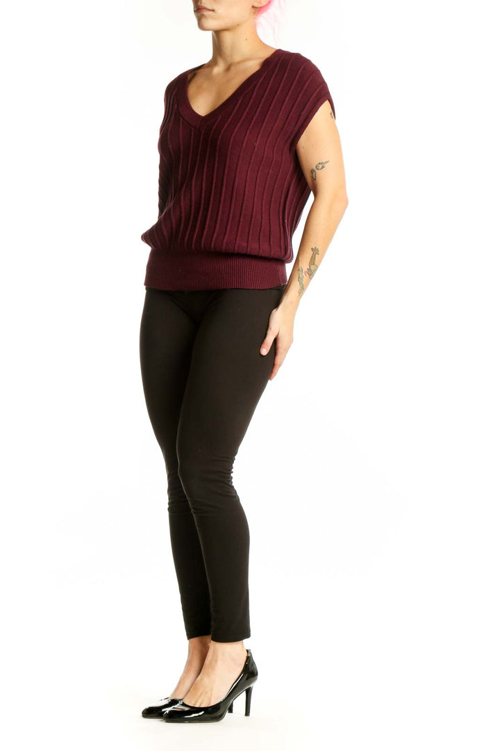 Burgundy ribbed v-neck knit top with cap sleeves, front view on model