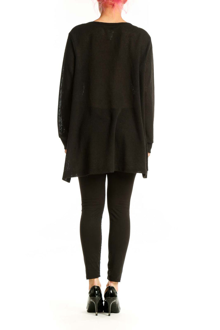 Black waffle knit v-neck tunic with asymmetrical hemline, back view