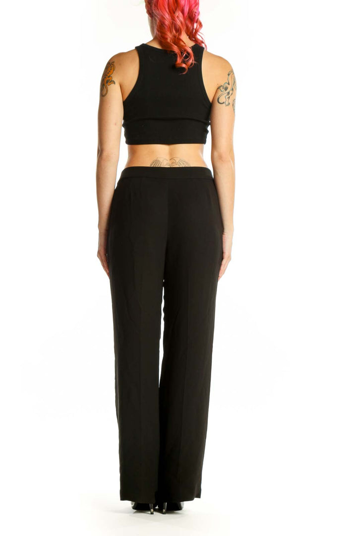 Black wide-leg dress pants back view, elegant silhouette