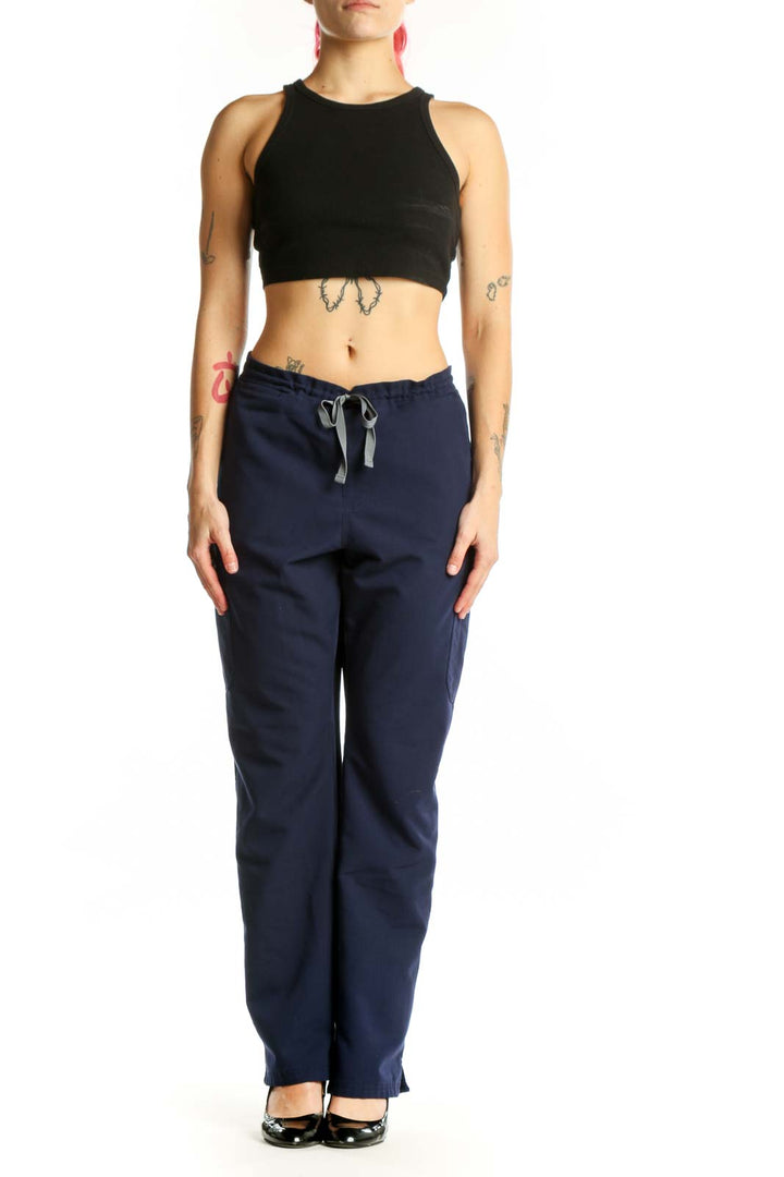 Navy drawstring medical scrub pants front view, size L, FIGS brand