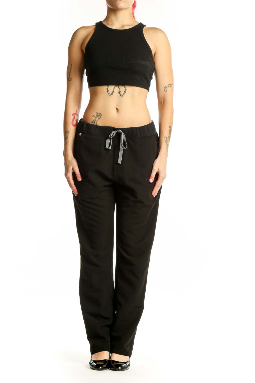 FIGS Black Drawstring Jogger Pants front view with tapered ankles and side pockets