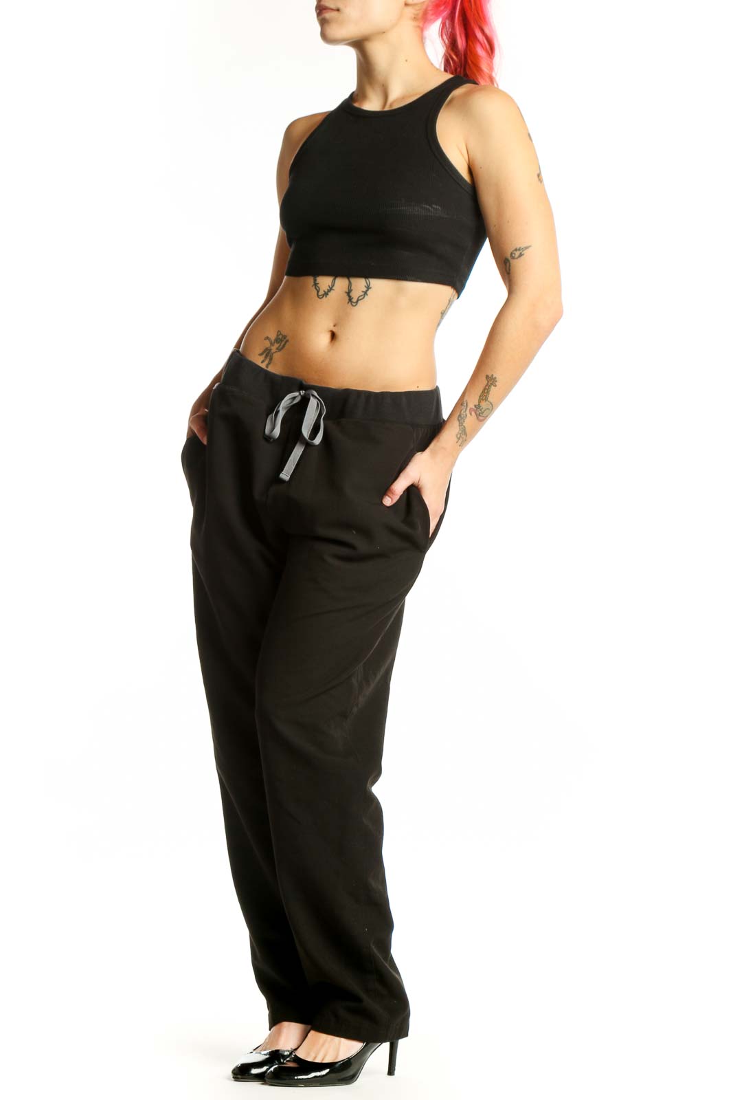 FIGS Black Drawstring Jogger Pants front view with tapered ankles and side pockets