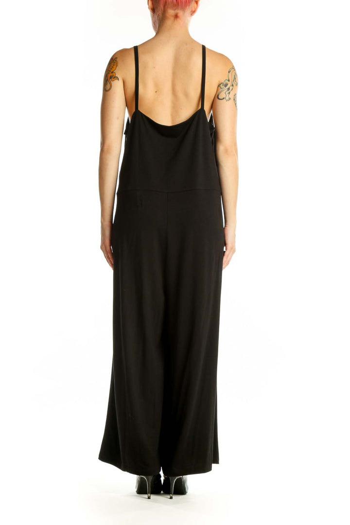 Black Tencel Spandex camisole maxi jumpsuit with adjustable straps, back view showing fluid drape