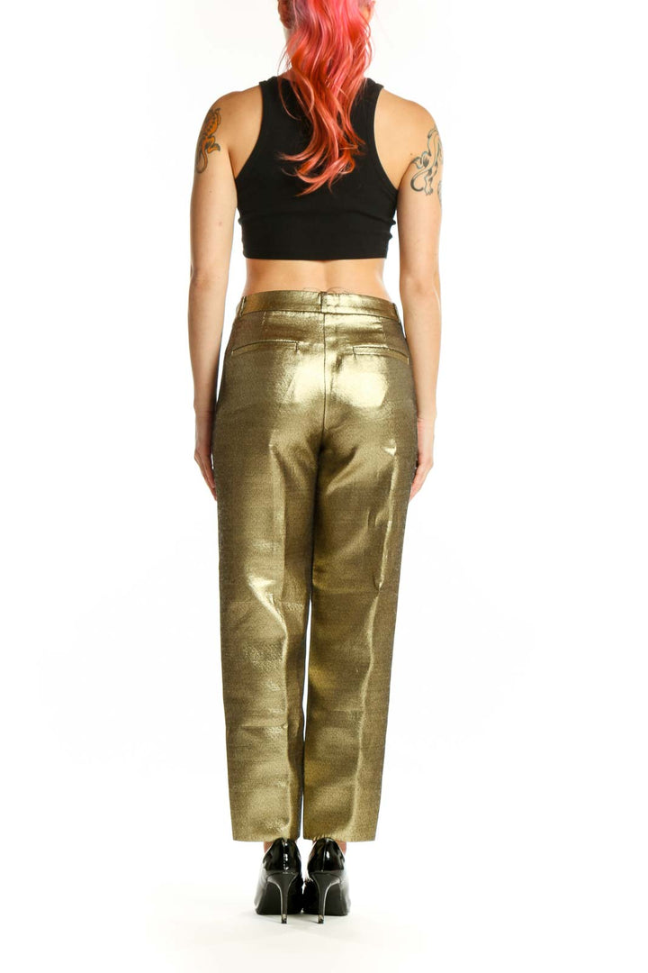 Gold metallic cropped ankle pants by Banana Republic, back view displaying sleek silhouette and side seam detail