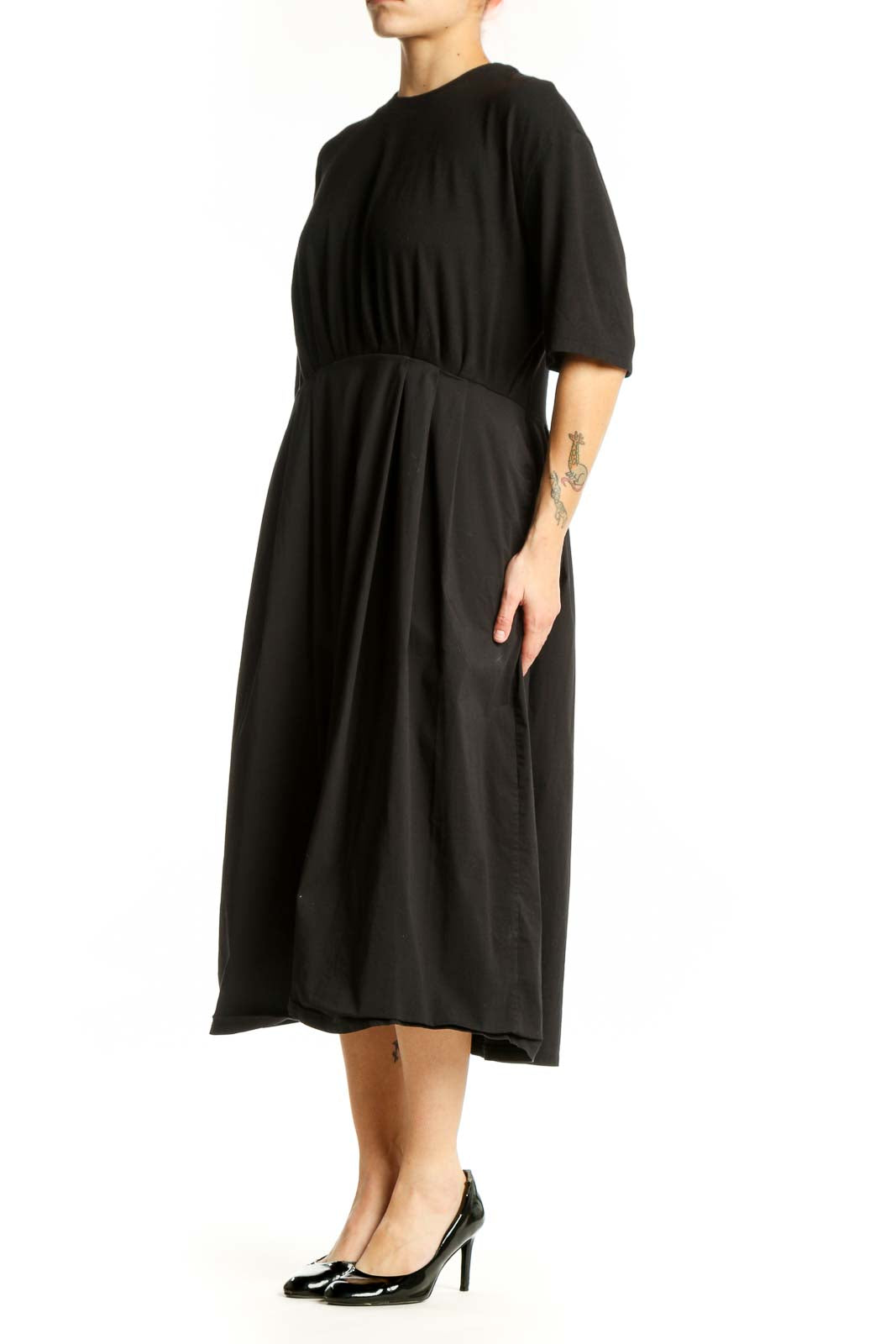 Black midi dress with cinched waist and three-quarter sleeves, front view