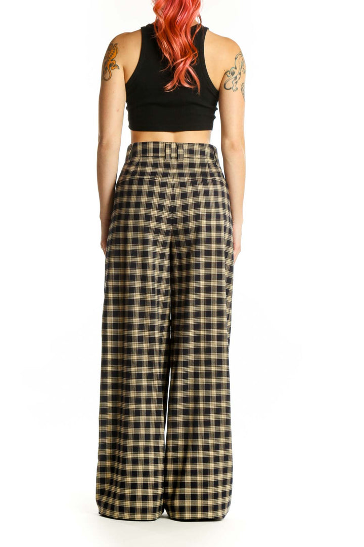 Black and cream plaid wide-leg pants with high-waisted paperbag design, back view