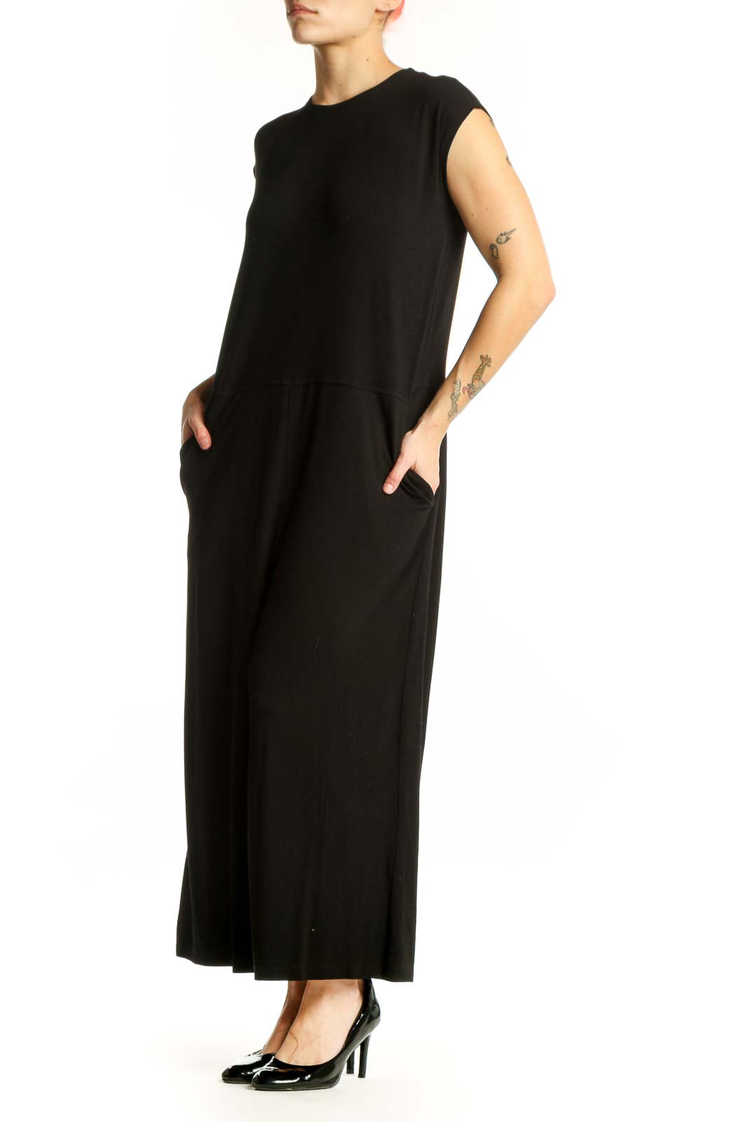 Black Tencel Lyocell and Spandex jumpsuit by Eileen Fisher, front view showing crew neckline, cap sleeves, and wide-leg cropped pants