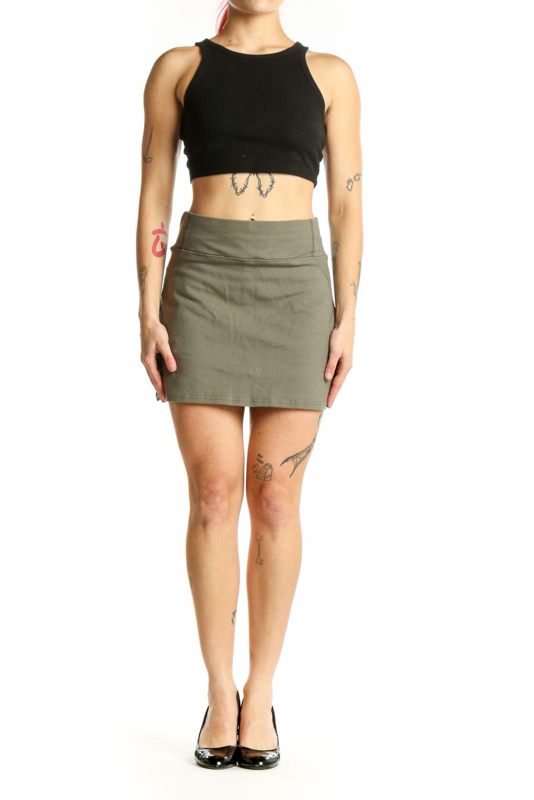 Sage green mini A-line skirt with high waist, front view on model