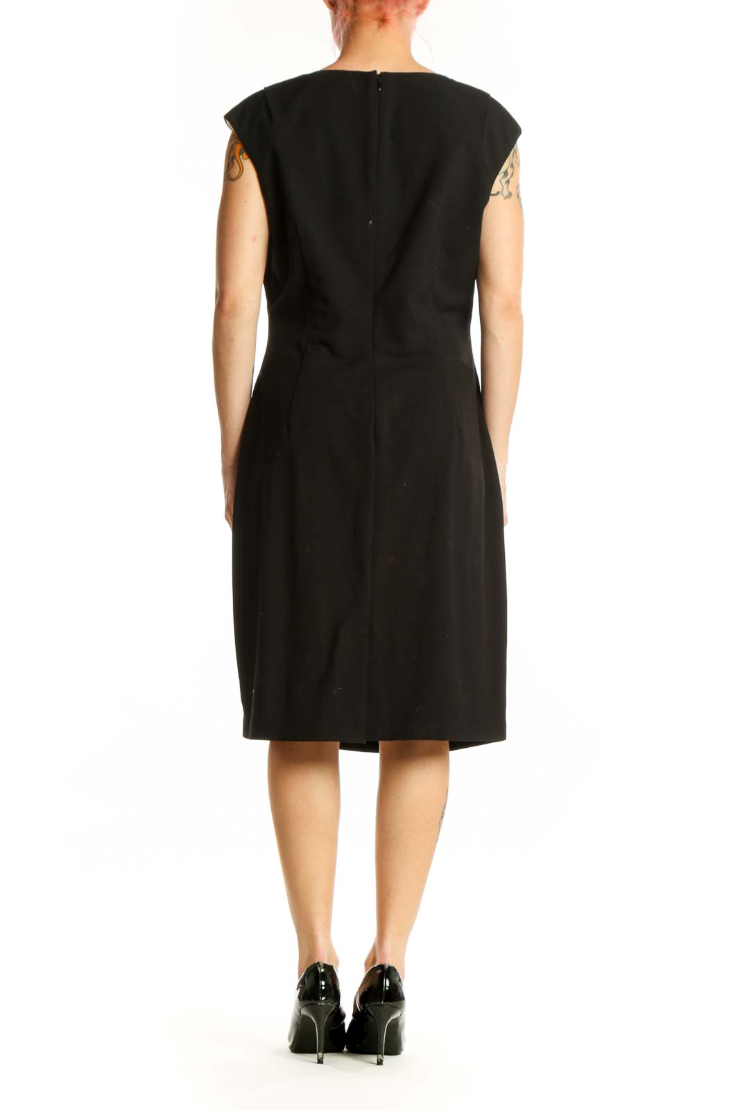 Black ruched cap sleeve dress with side ruching detail, back view on model
