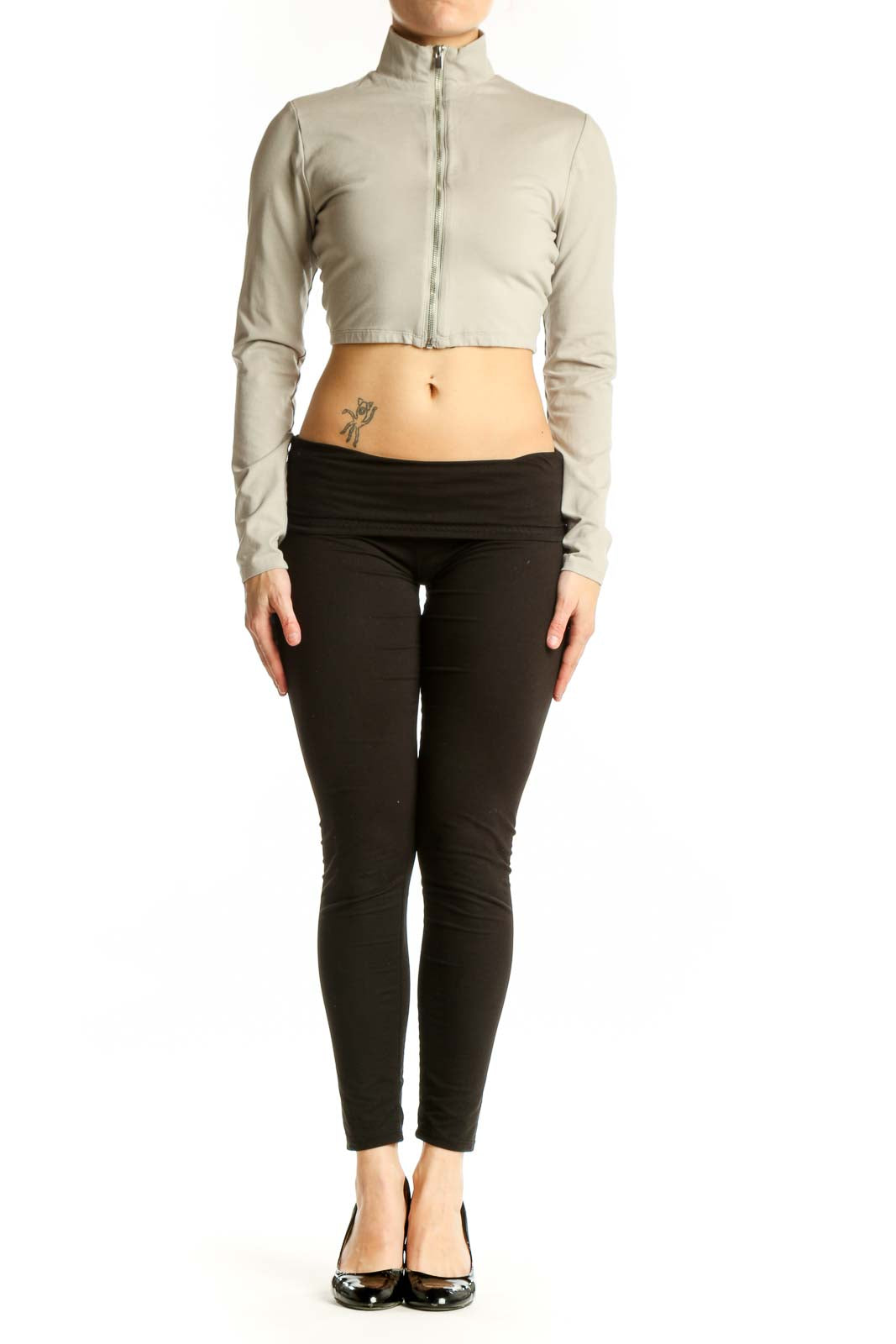 Cream cropped zip-up jacket front view, showing fitted silhouette and front zip closure