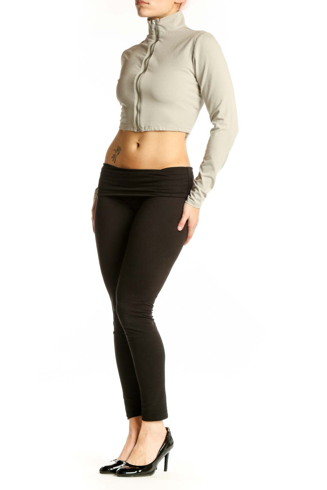Cream cropped zip-up jacket front view, showing fitted silhouette and front zip closure