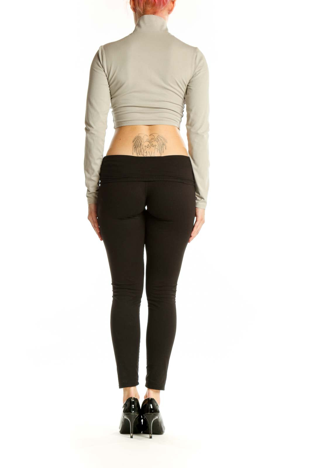 Cream cropped zip-up jacket back view, displaying the sleek back design and cropped length