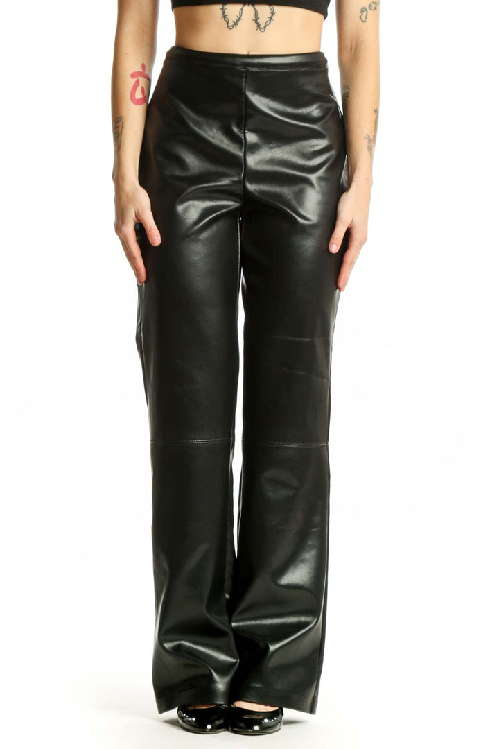 Black faux leather high-waisted straight-leg pants by Joseph Ribkoff, front view on model