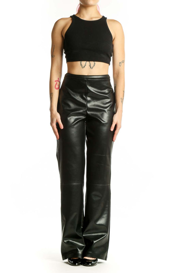 Black faux leather high-waisted straight-leg pants by Joseph Ribkoff, front view on model