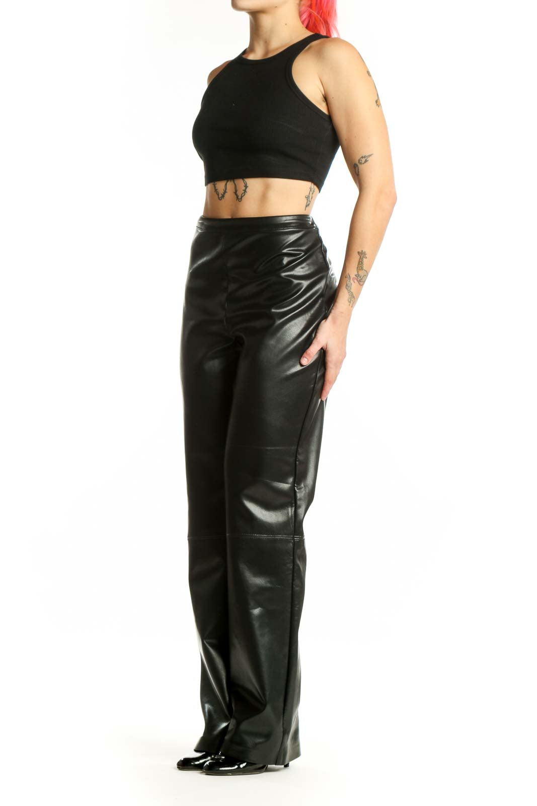 Black faux leather high-waisted straight-leg pants by Joseph Ribkoff, front view on model