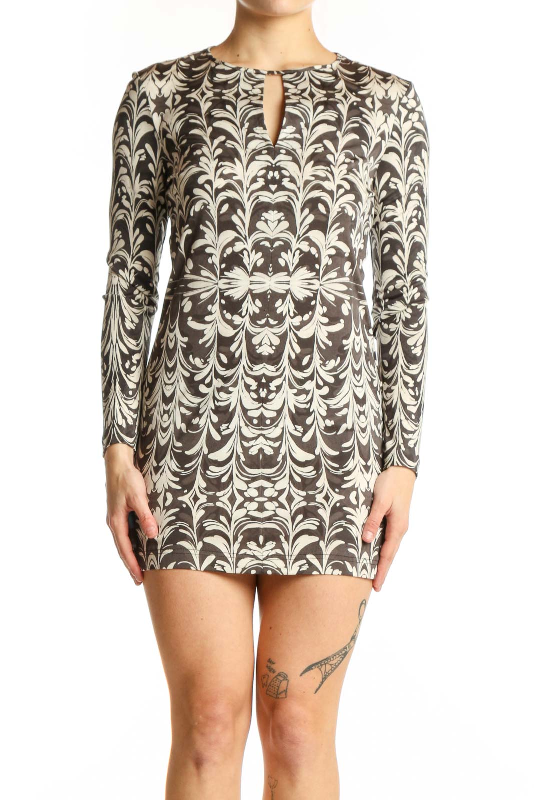 Cream damask print Tory Burch silk dress with long sleeves and keyhole neckline, front view