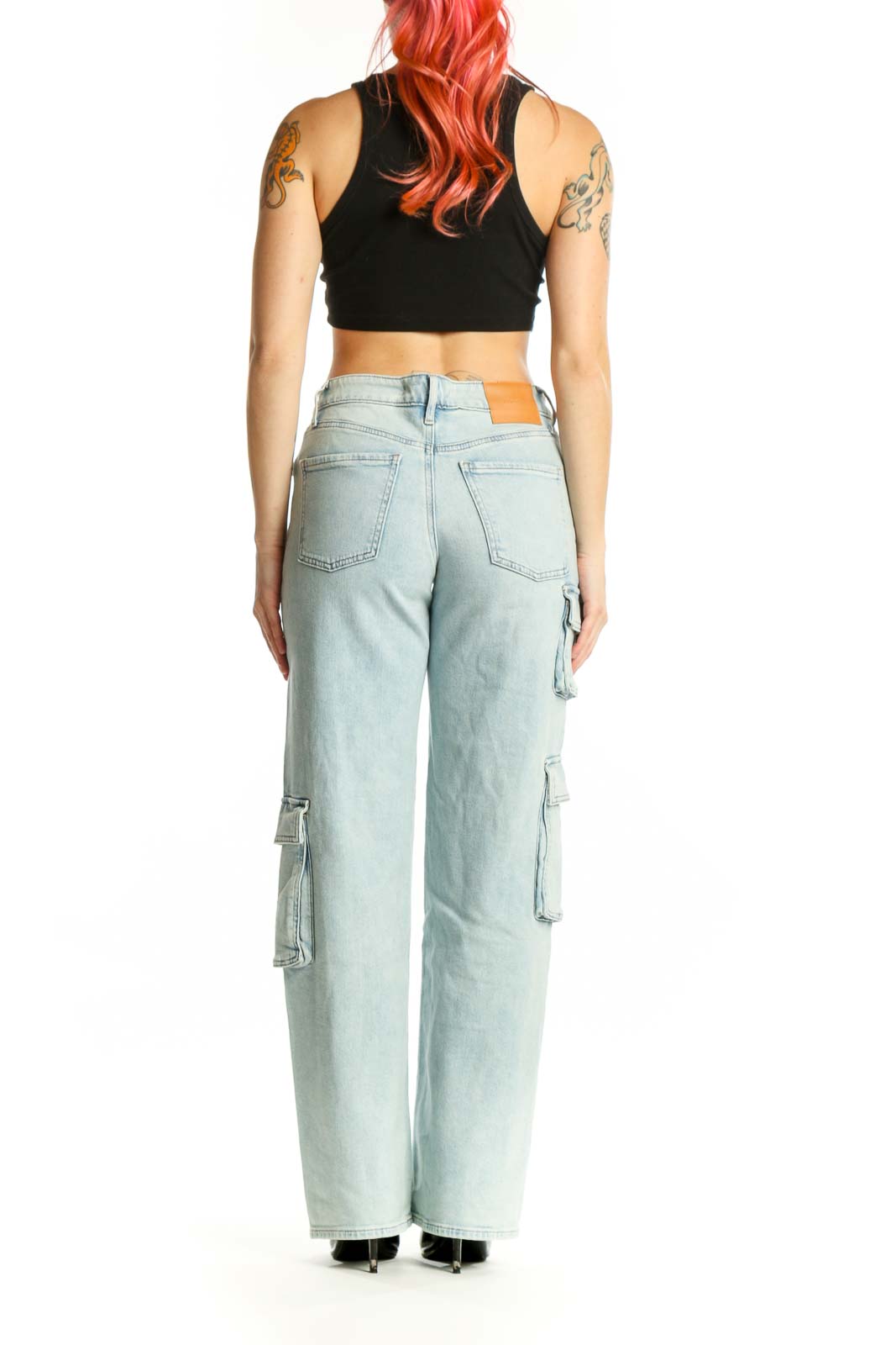 Light blue cargo denim jeans from Express in XS, showing back view with cargo pocket details and straight leg silhouette
