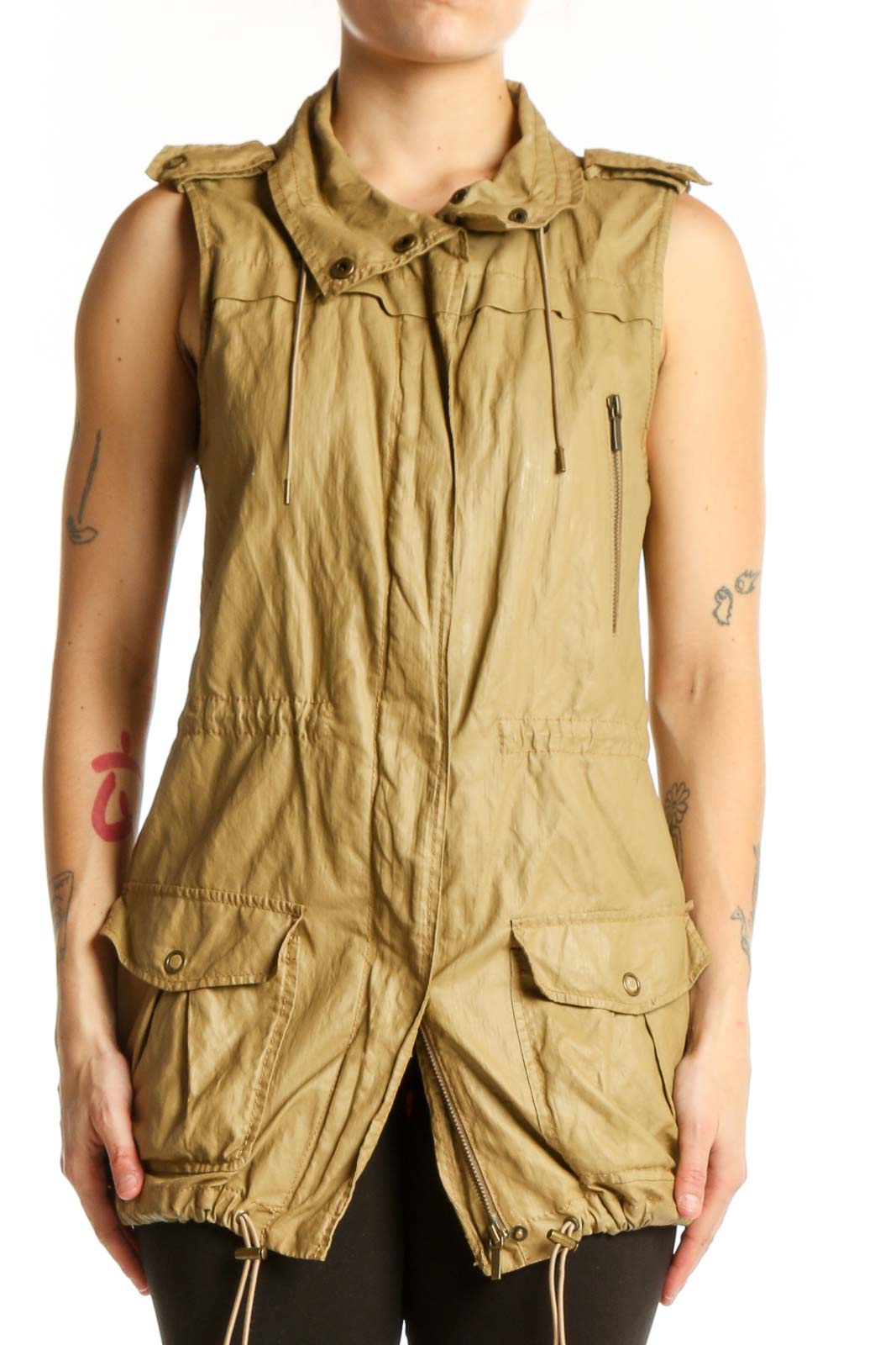 Beige sleeveless cargo vest top with metal hardware and cargo pockets, front view