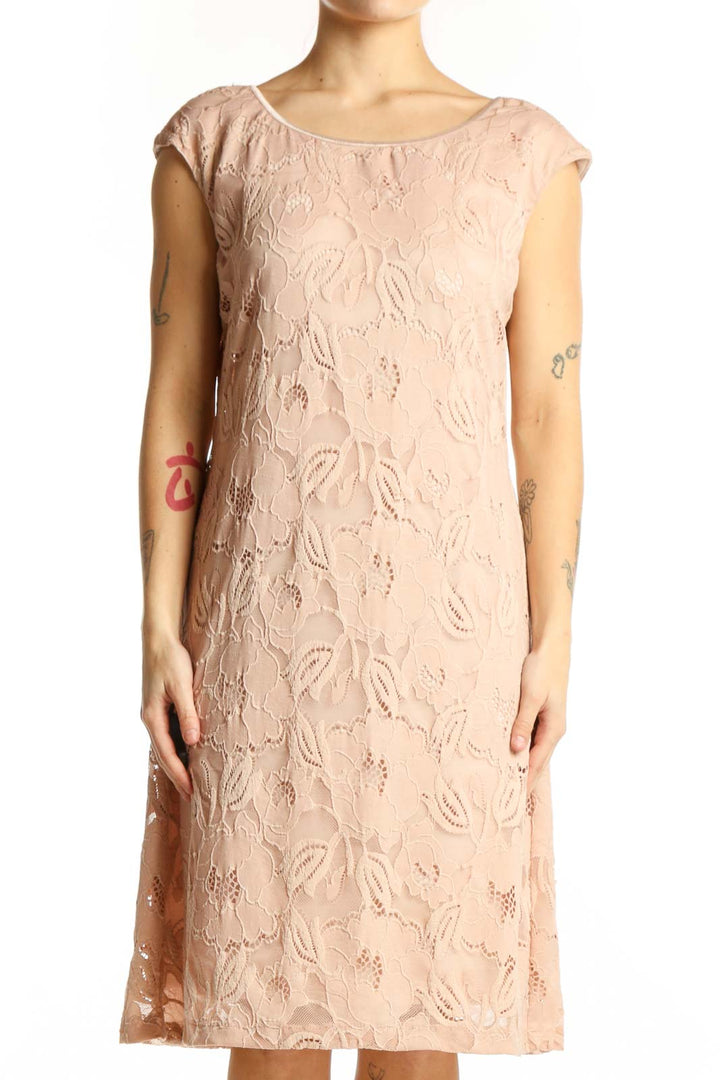 Beige lace shift dress front view featuring intricate all-over lace pattern and short cap sleeves