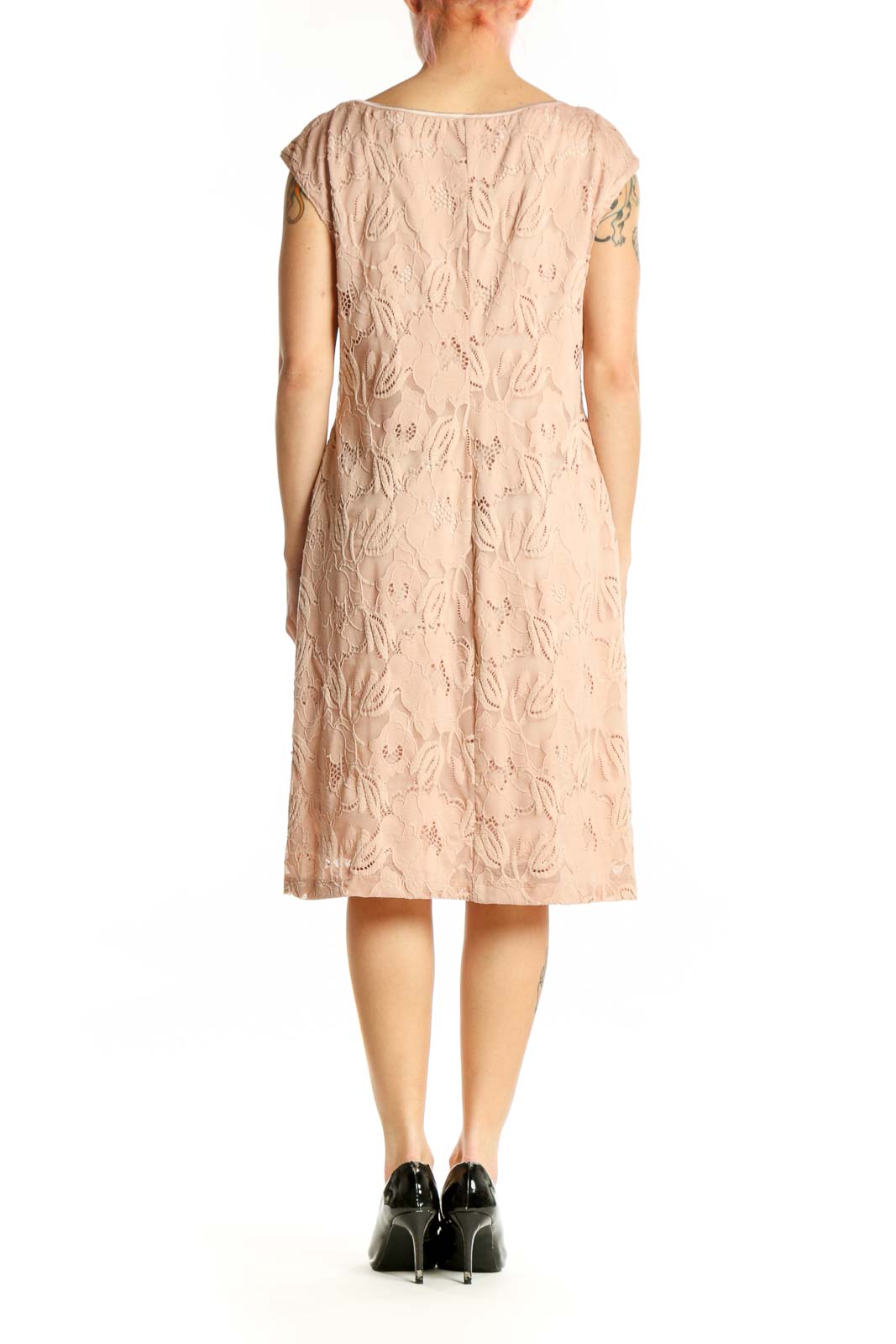Beige lace shift dress back view showing elegant lace design and relaxed A-line silhouette