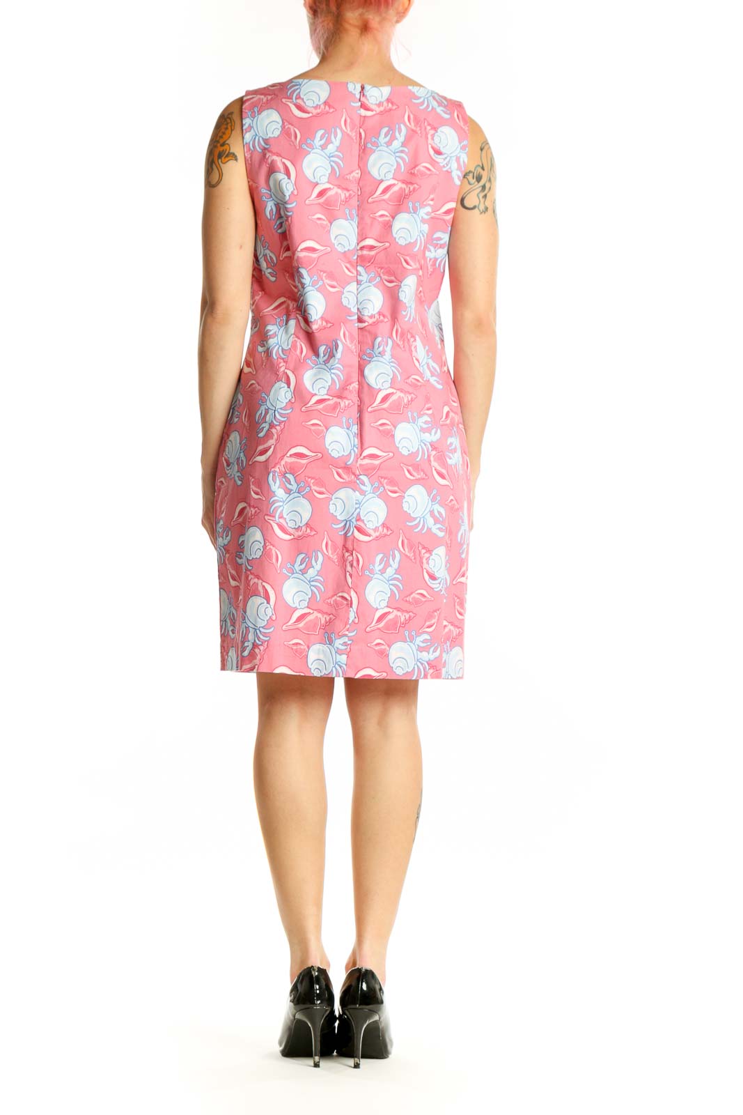Pink floral sleeveless dress back view, showing fitted silhouette and knee-length cut