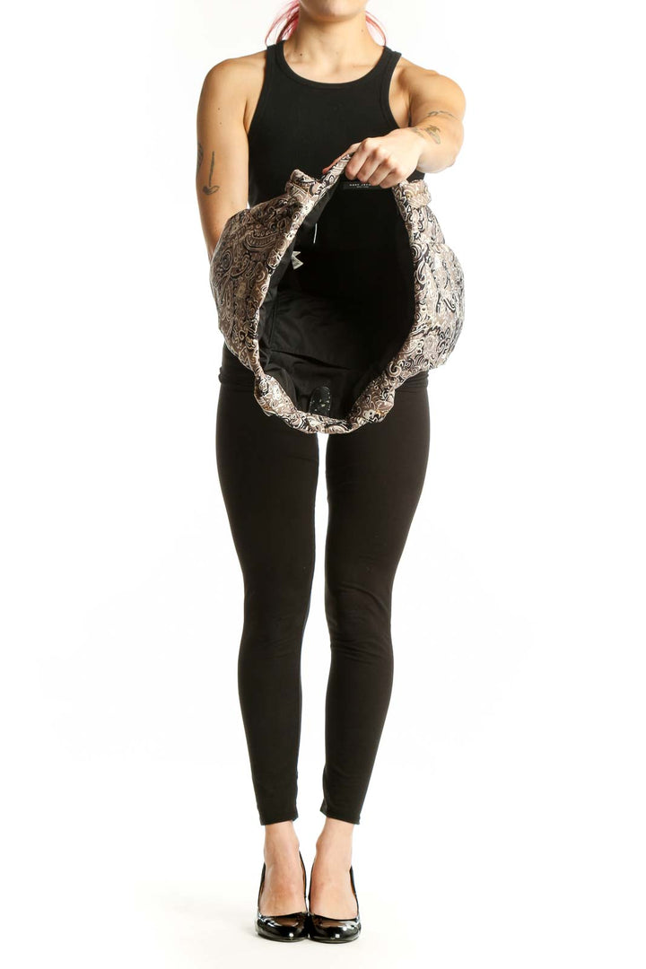 Beige and black paisley Marc Jacobs tote bag worn on shoulder, side view showing structured silhouette