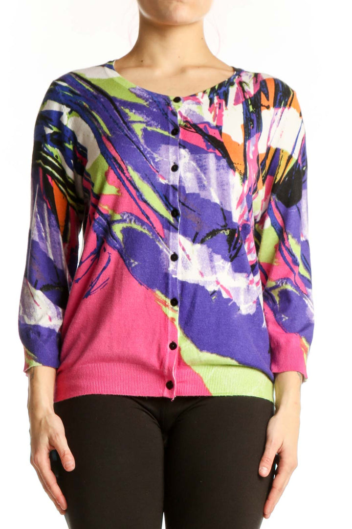 Front view of multicolor abstract cardigan top by JOSEPH A. featuring bold purple, pink, lime green, orange and white artistic print with button-front closure