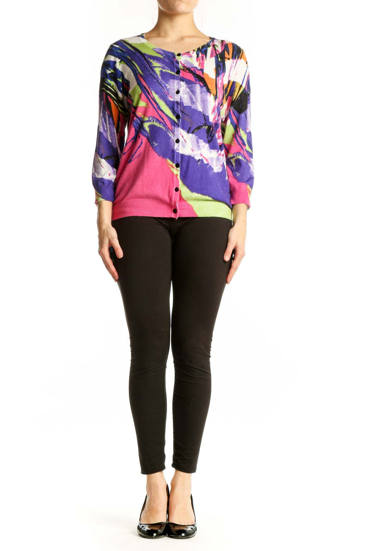 Front view of multicolor abstract cardigan top by JOSEPH A. featuring bold purple, pink, lime green, orange and white artistic print with button-front closure