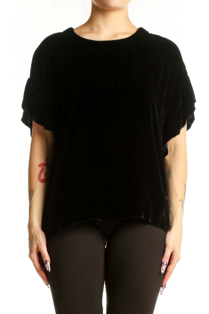 Black velvet short sleeve top with crew neckline and ruched sleeves, front view