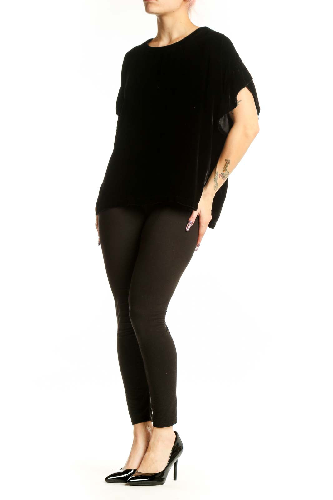 Black velvet short sleeve top with crew neckline and ruched sleeves, front view
