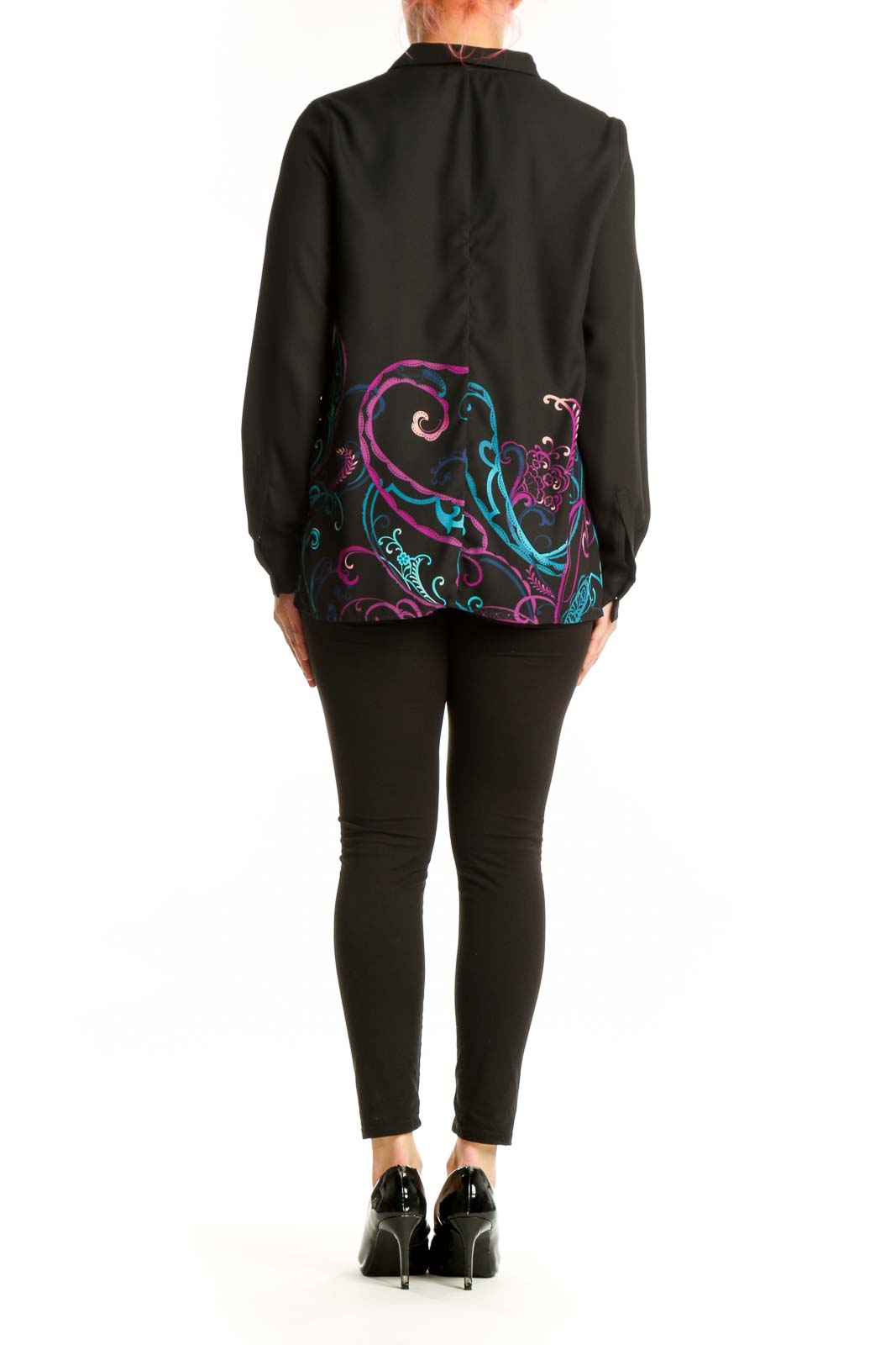 Back view of black embroidered floral blouse showing ornate scrollwork design