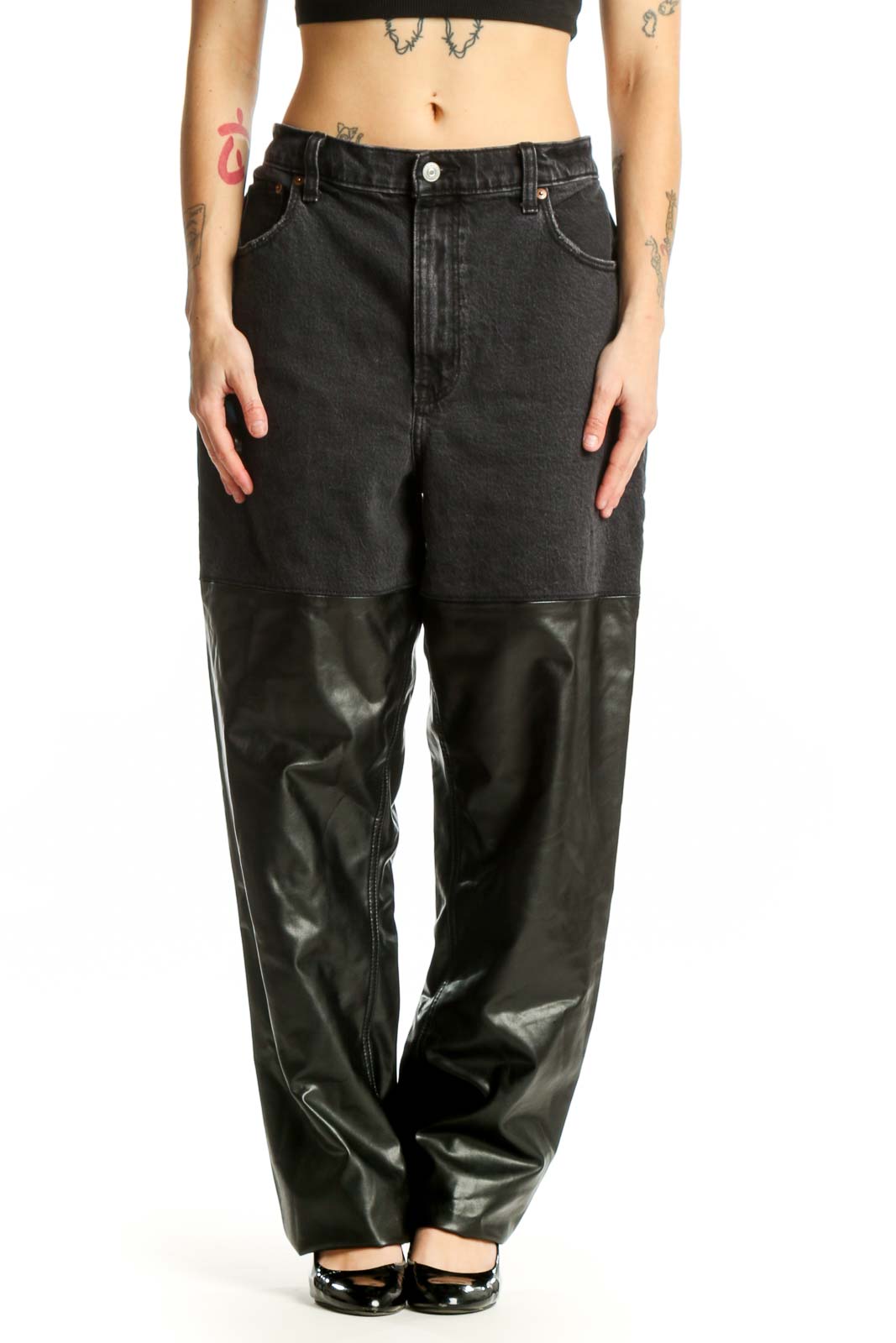 Front view of black denim and leather colorblock pants by Abercrombie & Fitch, size XL, showing high-waisted fit and mixed-material design