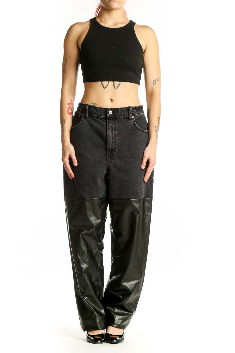 Front view of black denim and leather colorblock pants by Abercrombie & Fitch, size XL, showing high-waisted fit and mixed-material design