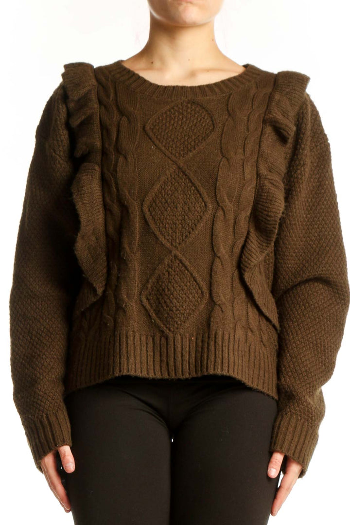 Brown cable knit sweater with ruffle shoulder detail and cable pattern front view