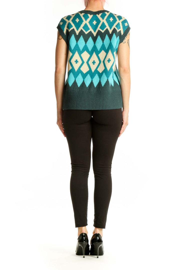 Tyler Boe teal geometric diamond knit vest back view, showing full pattern design and relaxed fit