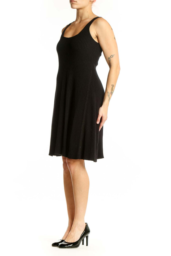 Black ribbed tank dress with A-line silhouette and scoop neckline, front view
