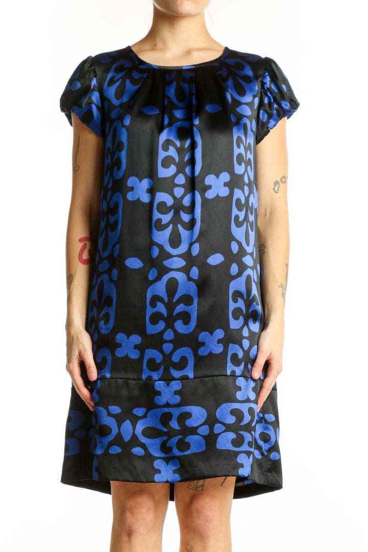 Black and blue floral print INC shift dress with cap sleeves, front view