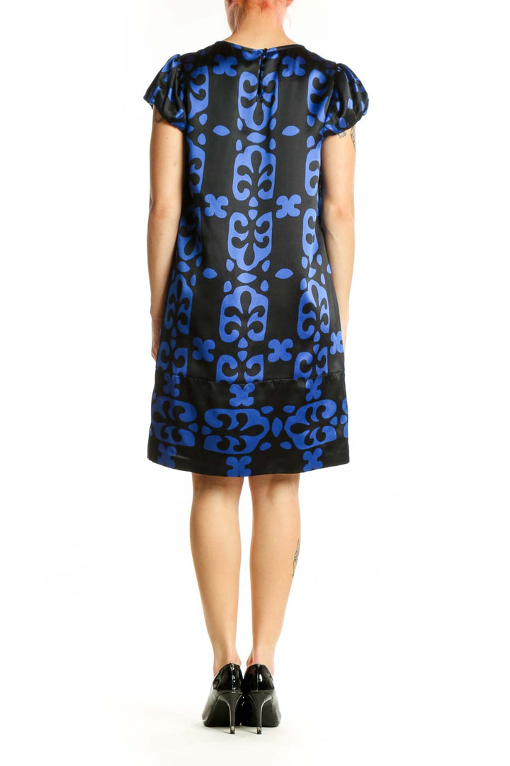 Black and blue floral print INC shift dress with cap sleeves, back view