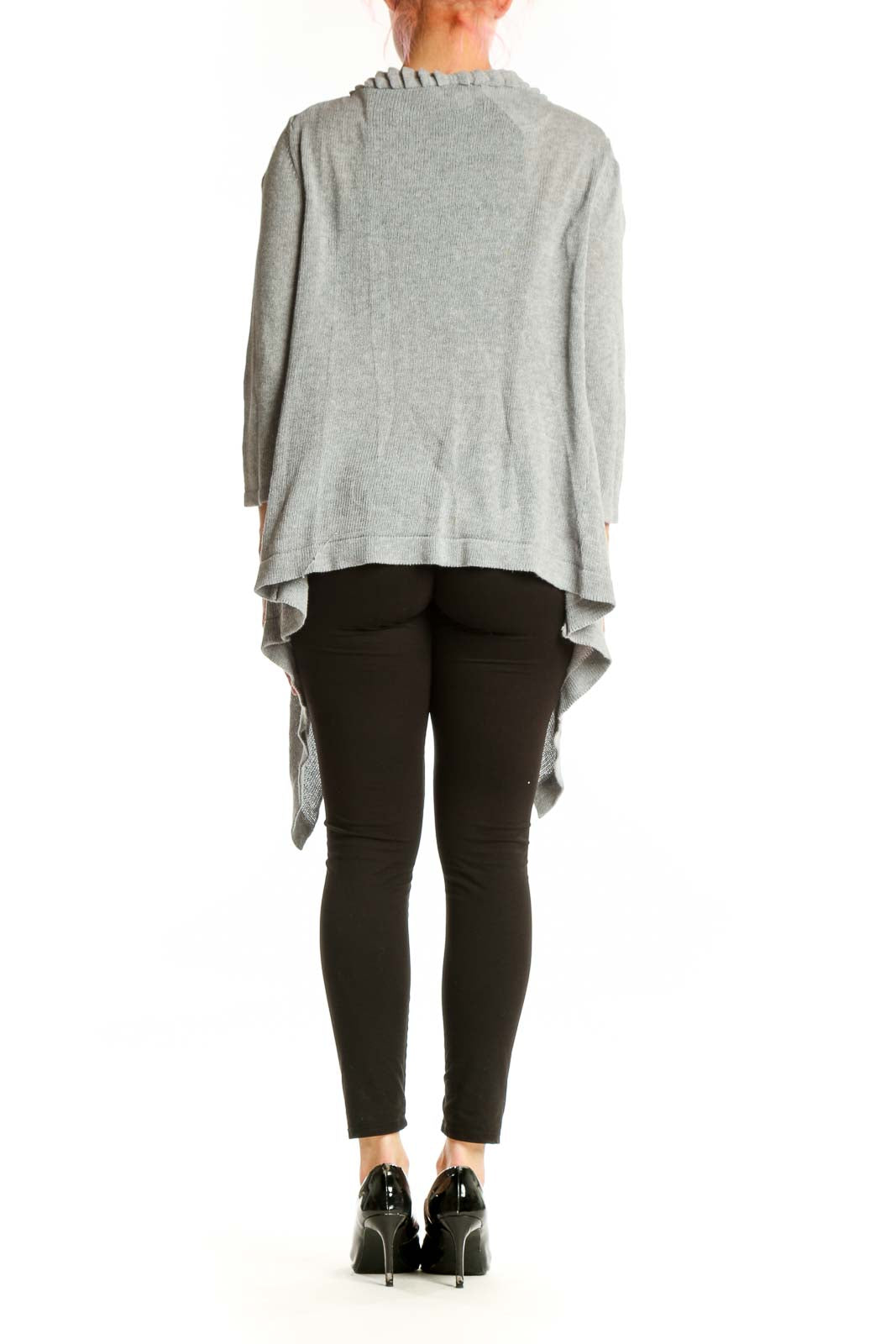 Back view of gray ruffled cotton cardigan showing flowing silhouette and three-quarter length sleeves