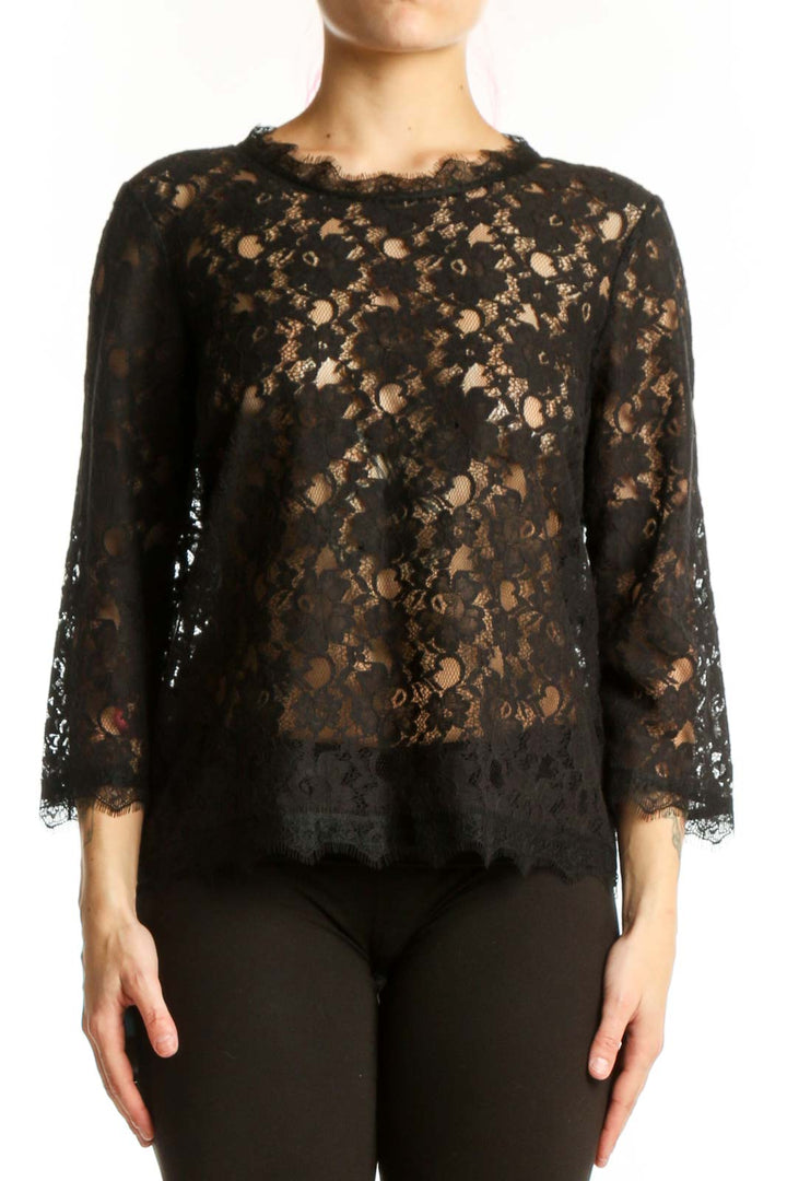 Black lace top with three-quarter sleeves and delicate all-over lace pattern, front view