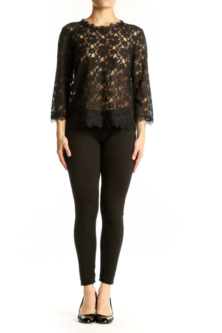 Black lace top with three-quarter sleeves and delicate all-over lace pattern, front view