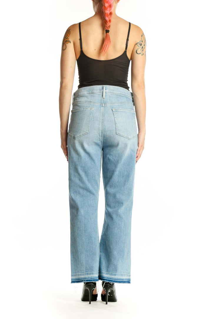 Light blue high-waisted straight leg jeans from LOFT with five-pocket construction, back view