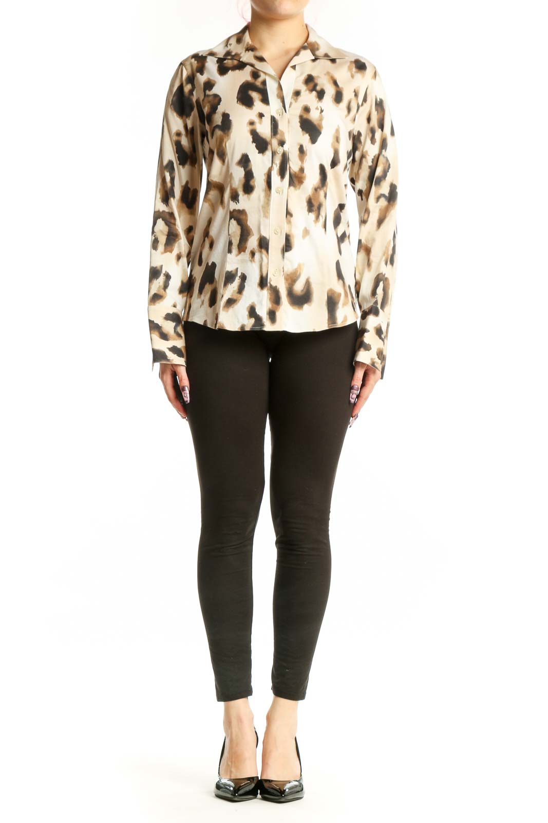 Front view of cream leopard print button-up shirt with black and tan animal pattern, long sleeves, and classic collar