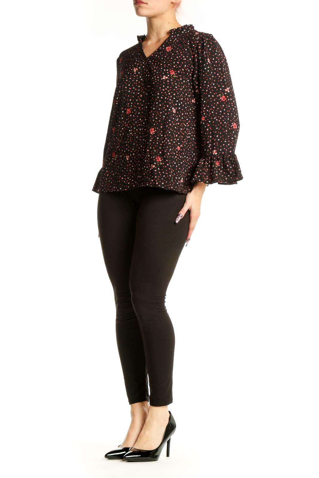 Black floral top with red and gold blooms and ruffle three-quarter sleeves, front view