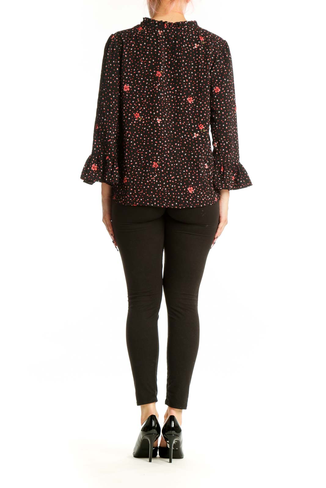 Black floral ruffle sleeve top back view showing full pattern and sleeve detail