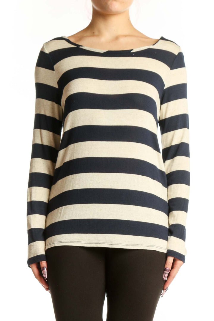 Navy and cream striped long sleeve top with crew neckline, front view