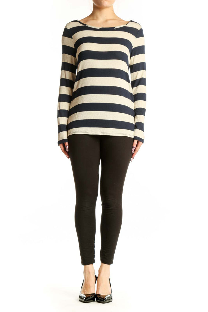 Navy and cream striped long sleeve top with crew neckline, front view