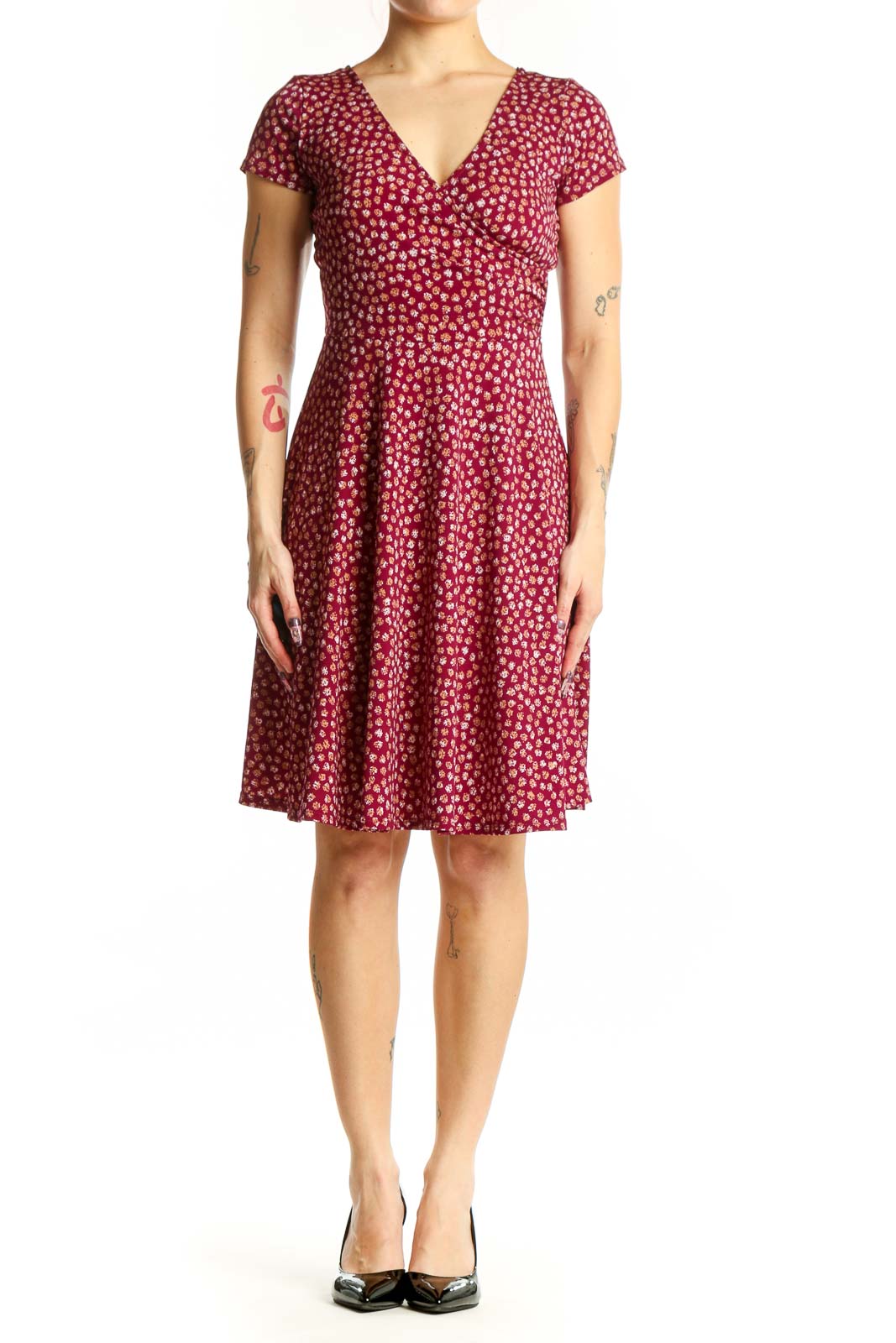 Burgundy floral wrap dress with short sleeves and V-neckline, front view on model