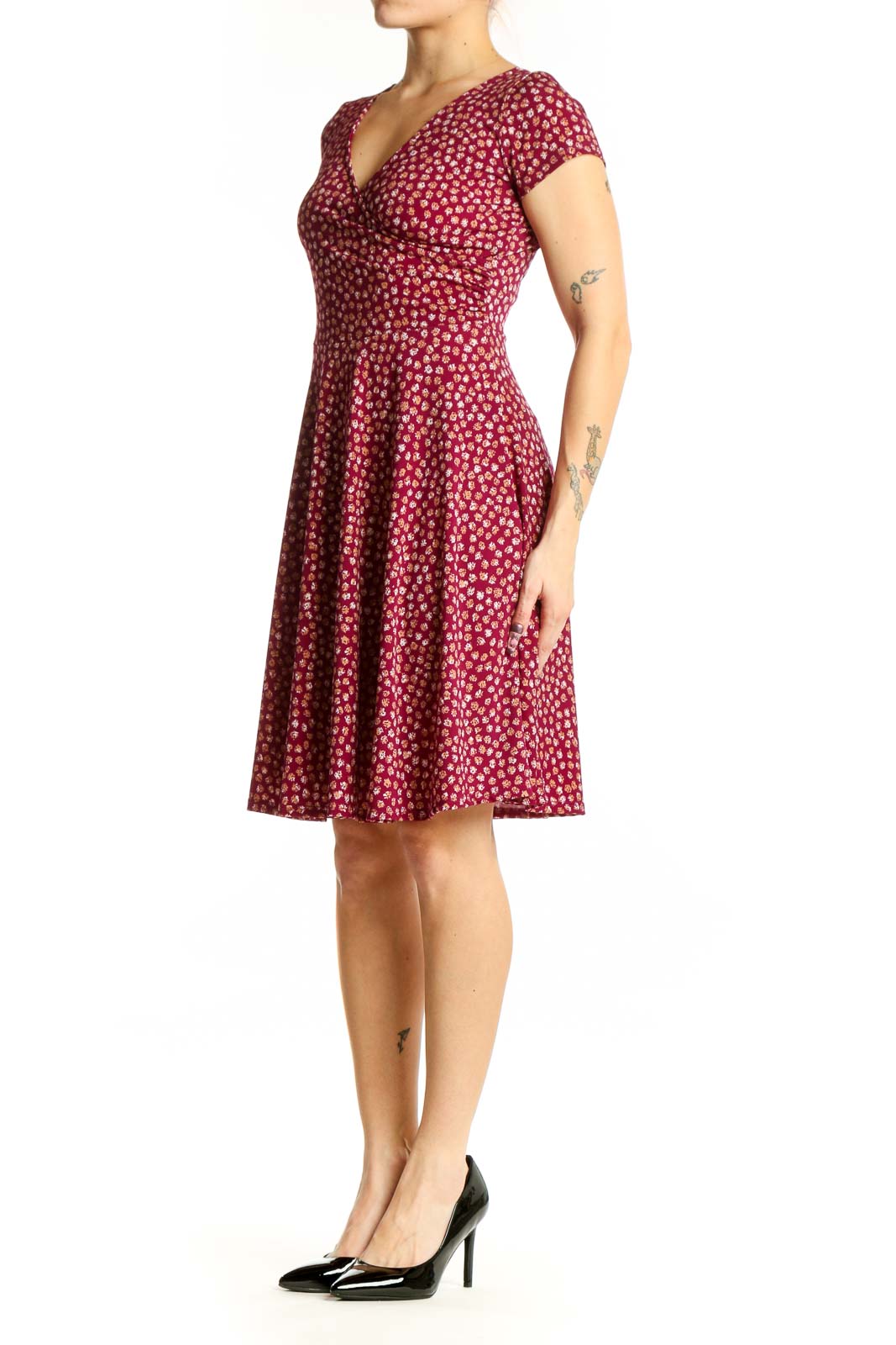 Burgundy floral wrap dress with short sleeves and V-neckline, front view on model