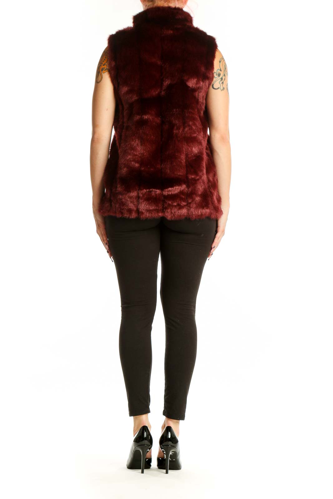 Back view of burgundy faux fur sleeveless vest showing plush texture and tailored fit